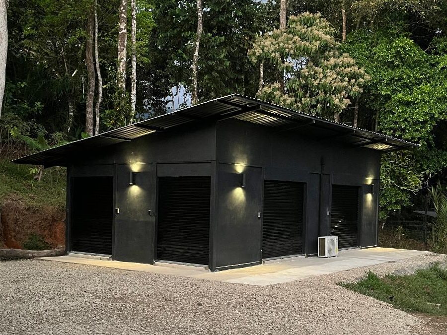 Spaces climate-controlled storage facility at night in Ojochal, Costa Rica